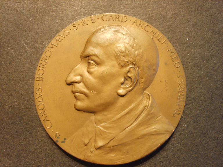 Medaglia commemorativa del terzo centenario della canonizzazione di san Carlo Borromeo, San Carlo Borromeo/ San Carlo Borromeo sale fra i santi del Paradiso accolto da Gesù cristo e dalla Madonna (medaglia) - ambito italiano (sec. XX)