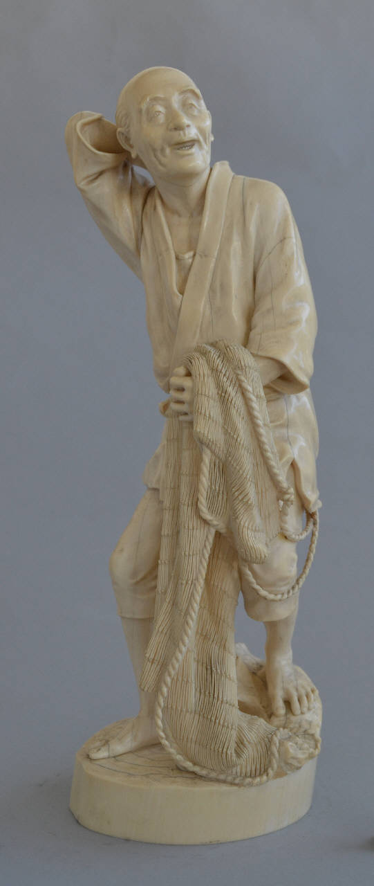 pescatore con la rete (statuetta) - manifattura giapponese (fine/inizio secc. XIX/ XX)
