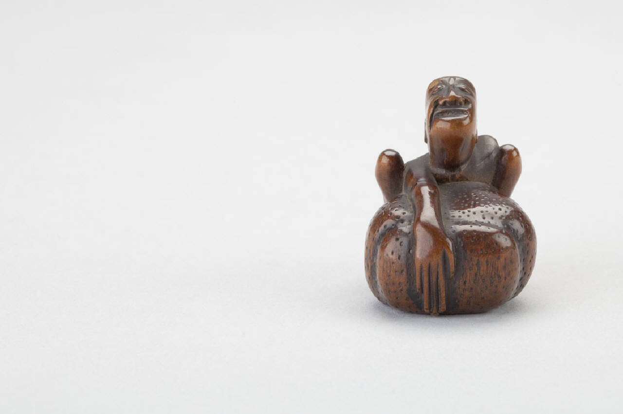 uomo che regge un grande peso (netsuke) - manifattura giapponese (sec. XIX)