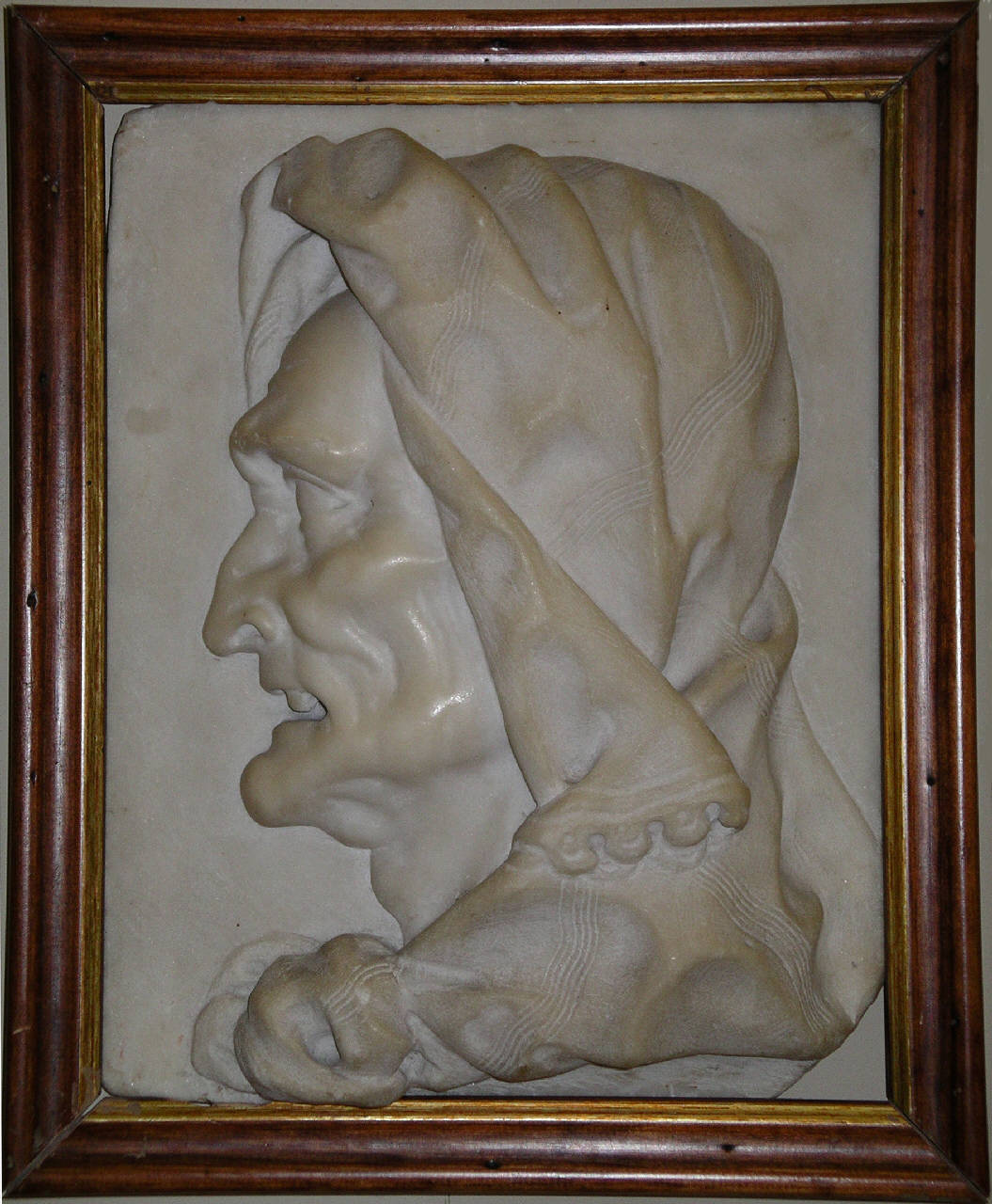 testa di vecchia di profilo (rilievo) di Le Court, Giusto (sec. XVII)