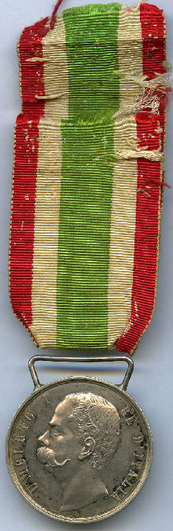 Medaglia a ricordo dell'Unità d'Italia (Medagliere di Giuseppe Tironi), Umberto I; corona vegetale (decorazione militare) - produzione (sec. XIX)