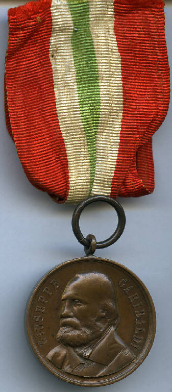 Medaglia a ricordo della morte del generale Giuseppe Garibaldi (Medagliere di Giuseppe Tironi), Giuseppe Garibaldi; iscrizione (medaglia) - produzione (sec. XIX)