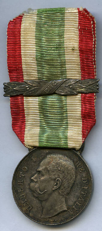 Medaglia a ricordo dell'Unità d'Italia (Medagliere di Martiniano (?) Bottagisi), Umberto I; corona vegetale (decorazione militare) - produzione (sec. XIX)