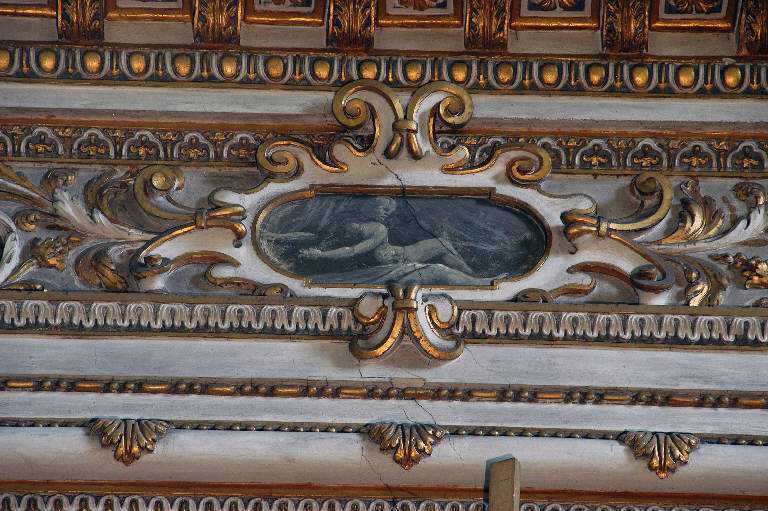 Putto, Motivi decorativi a volute (decorazione plastico-pittorica) di Sala, Giovanni Angelo; Sala, Gerolamo (bottega; bottega) (sec. XVII)
