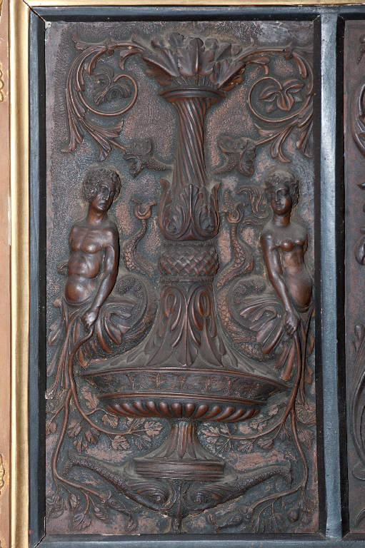 Motivi a candelabra con nudo maschile e nudo femminile (rilievo) di Germani, Giovanni Simone; Cicardi, Giovanni (sec. XVI)