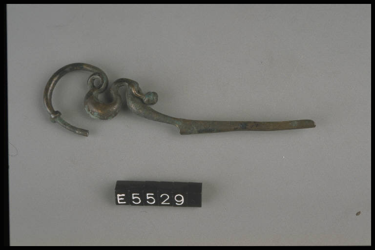 fibula a drago - cultura di Golasecca (secc. VI/ V a.C.)