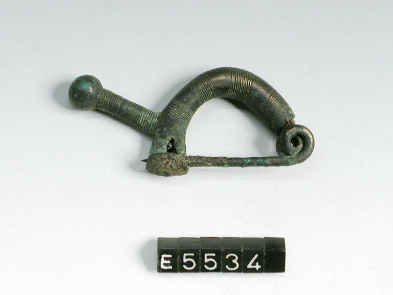 fibula ad arco pieno, DE MARINIS / tipo Civiglio - cultura di Golasecca (sec. V a.C.)