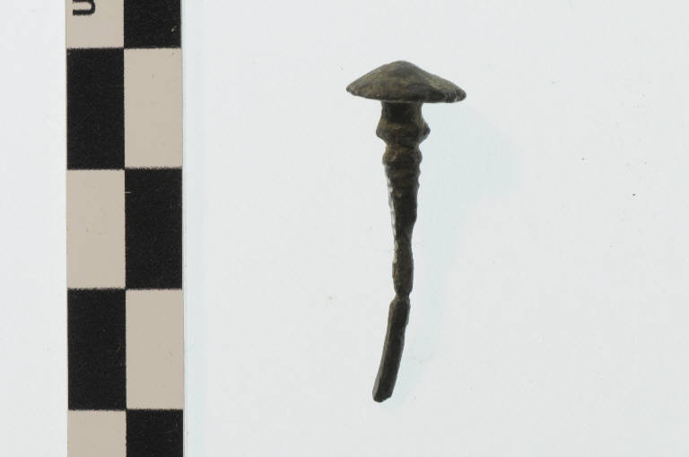 spillone con capocchia a ombrellino, Carancini, tipo Vadena - Prima Età del Ferro (sec. VIII a.C.)