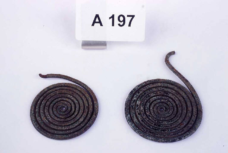 fibula ad occhiali - ambito villanoviano (sec. VIII a.C.)