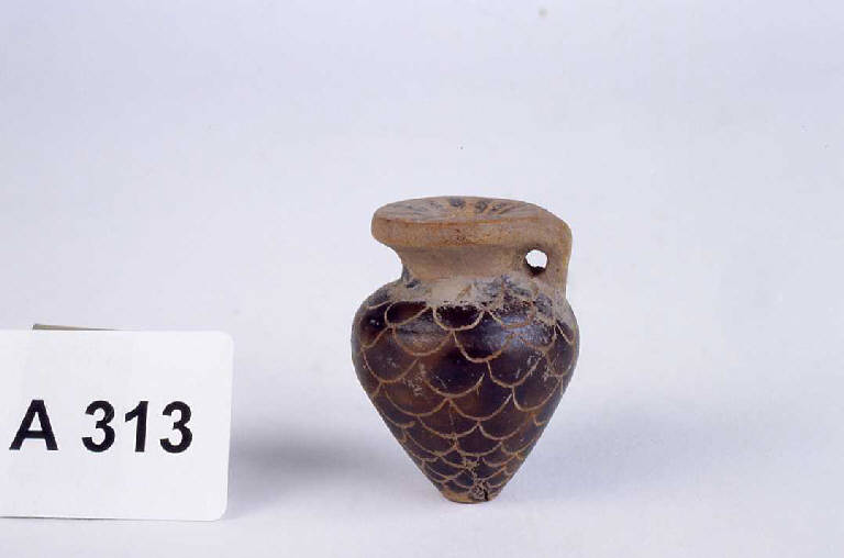 alabastron - produzione etrusca (secc. VII/ VI a.C.)