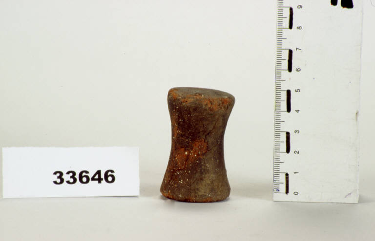 rocchetto concavo - cultura golasecchiana (prima età del Ferro)
