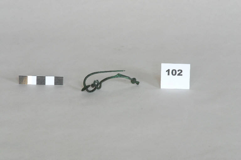 fibula a nastro serpeggiante - cultura golasecchiana (prima età del Ferro)