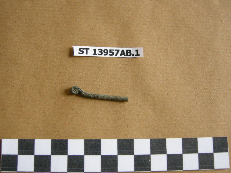 spillone, Spillone con capocchia a rotolo - cultura di Golasecca (sec. VII a.C.)