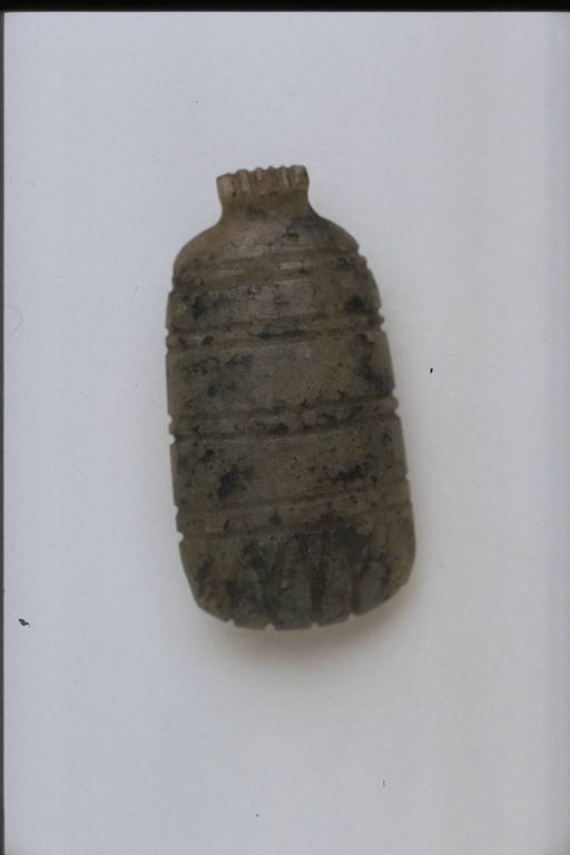 Panno aperto e frangiato (?) (AMULETO) - produzione egizia (secc. VII/ I a.C.)