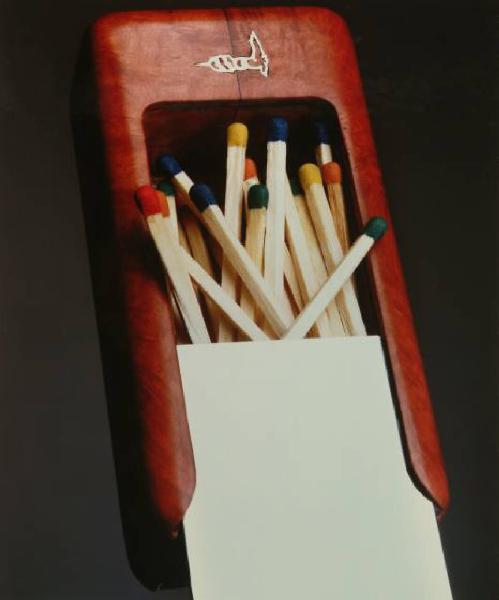 Campagna pubblicitaria per Trussardi Inside - Accessori - Porta fiammiferi in radica e argento