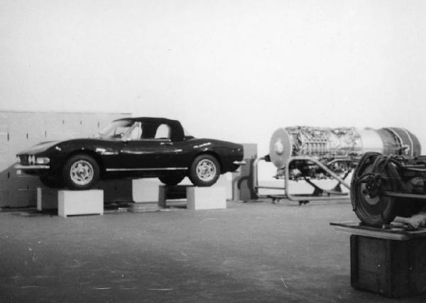 Milano. Stabilimento della Agfa-Gevaert - automobile modello Fiat Dino sollevata da terra - turbogetto - pannello porta-lastre