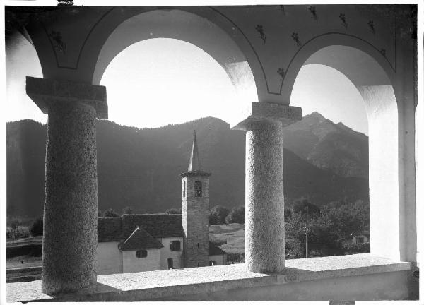 Veduta architettonica. Valle Vigezzo - Santa Maria Maggiore - Buttogno - Campanile dell'oratorio di S. Lorenzo dall'asilo Celso Rastellini