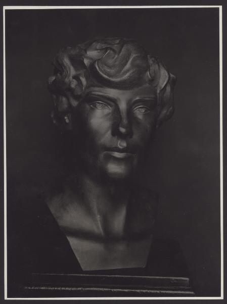 Aurelio Bossi, testa di giovane, scultura in metallo.