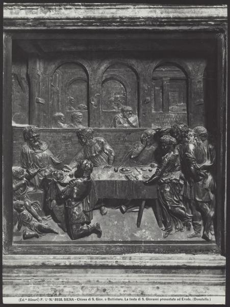 Siena - Battistero. Donatello, Banchetto di Erode, bassorilievo in bronzo dorato del fonte battesimale (1427).