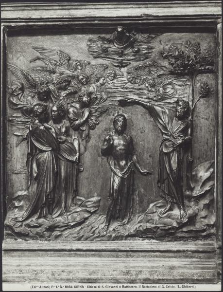 Siena - Battistero. Fonte battesimale, Lorenzo Ghiberti, Battesimo di Cristo, rilievo in bronzo (1427).