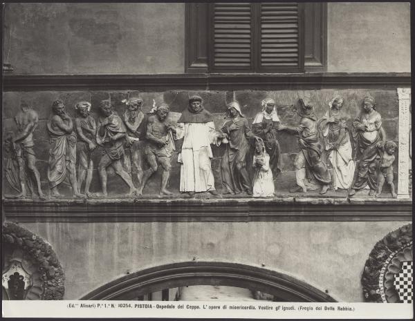 Pistoia - Spedale del Ceppo. Portico, Santi Buglioni, Vestire gli ignudi, particolare del fregio raffigurante le sette Opere di Misericordia, terracotta invetriata policroma (1526-28).