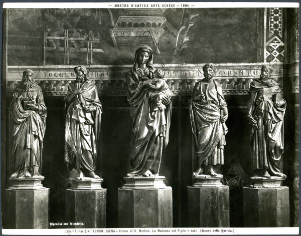 Siena - Chiesa di S. Martino. Jacopo della Quercia e aiuti, Madonna con Bambino e i SSan Pietro, Bartolomeo, Giovanni e Antonio Abate, statue lignee dorate.