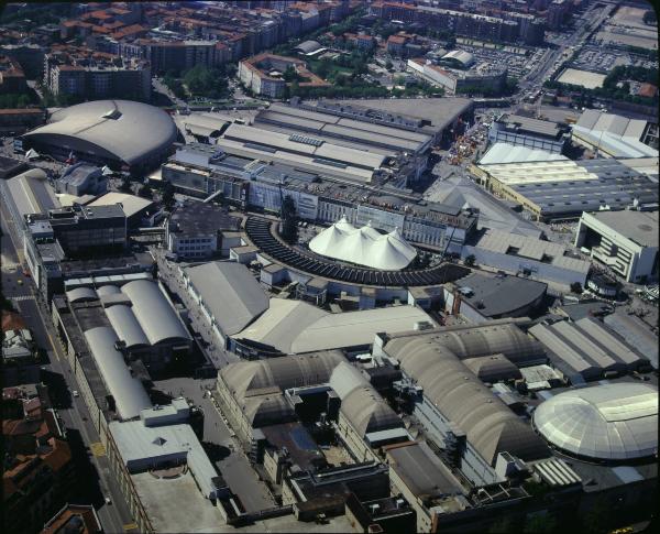 Milano. Fiera di Milano. Quartiere fieristico attorno al Viale dell'Industria. Palazzo delle Nazioni. Veduta aerea.