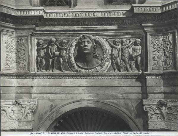 Rilievo - Busto virile e putti - Donato Bramante e Agostino de Fondutis - Milano - Chiesa di Santa Maria preso S. Satiro - Battistero