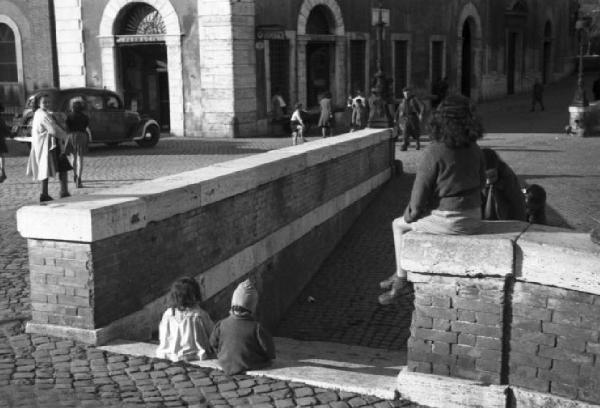 Roma. Momenti di vita quotidiana nell'isola Tiberina