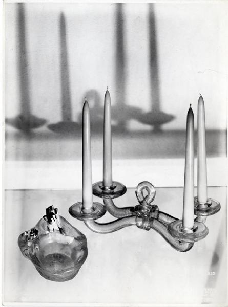 VII Triennale - Mostra dei metalli e dei vetri - Produzione Seguso - Candeliere e posacenere in cristallo