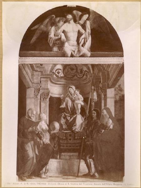 Lotto, Lorenzo - Cristo morto sorretto da due angeli (lunetta), Madonna con Bambino e i santi Pietro, Cristina, Liberale e Girolamo - Pala di Santa Cristina - Dipinto - Olio su tavola - Treviso - Chiesa di Santa Cristina al Tiverone