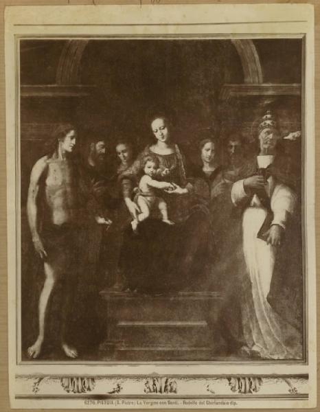 Ghirlandaio, Ridolfo - Madonna con Bambino in trono tra san Sebastiano, san Giacomo Maggiore, san Giovanni Battista, san Gregorio Magno e sante - Dipinto su tavola - Pistoia - Chiesa di S. Pietro Maggiore