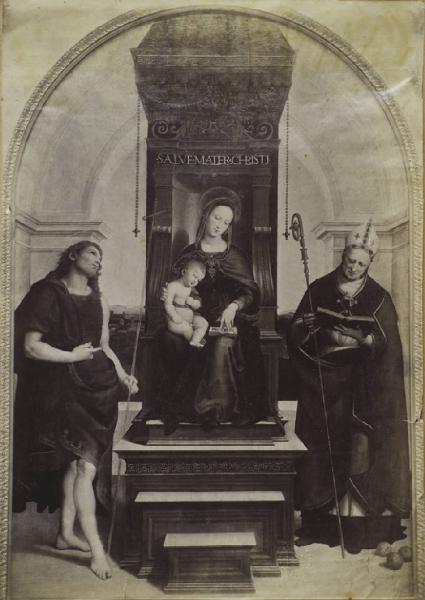 Sanzio, Raffaello - Madonna con Bambino leggenti in trono tra i santi Giovanni Battista e Nicola di Bari (Pala Ansidei) - Dipinto - Olio su tavola - Regno Unito