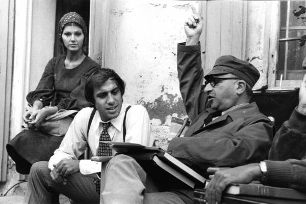 Set del film "Bianco, rosso e..." - Regia Alberto Lattuada - 1972 - Il regista Alberto Lattuada e gli attori Adriano Celentano e Claudia Mori sul set