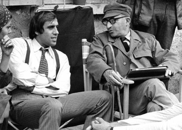 Set del film "Bianco, rosso e..." - Regia Alberto Lattuada - 1972 - Il regista Alberto Lattuada con gli attori Adriano Celentano e Claudia Mori sul set