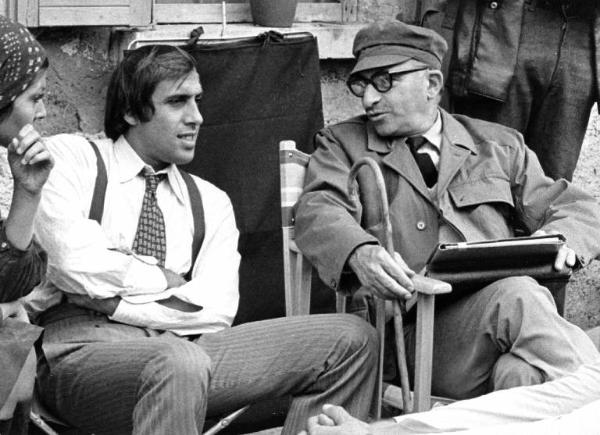 Set del film "Bianco, rosso e..." - Regia Alberto Lattuada - 1972 - Il regista Alberto Lattuada con gli attori Adriano Celentano e Claudia Mori sul set