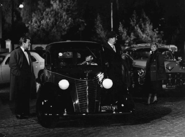 Set del film "Il bidone" - Federico Fellini - 1955 - Gli attori Broderick Crawford, Richard Basehart e Giulietta Masina
