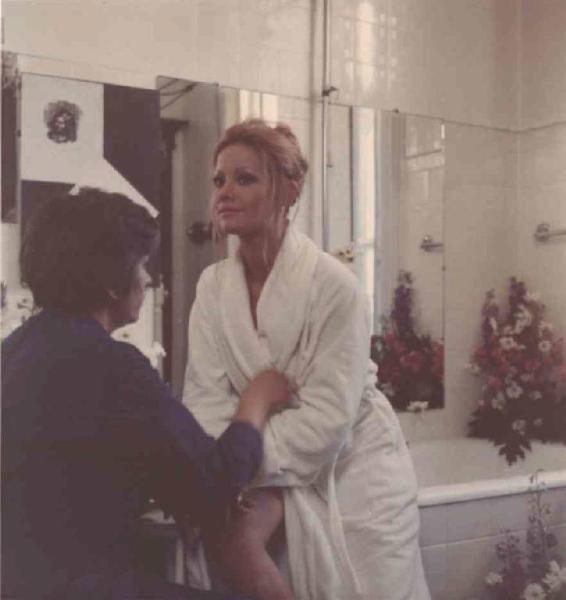 Set del film "Come ti chiami amore mio?" - Regia Umberto Silva - 1970 - Un attrice non identificata al trucco.