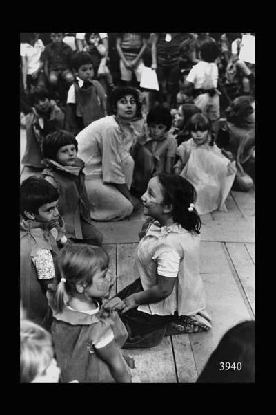 Milano. Parco Sempione. Festa dell'Unità: bambini in maschera.