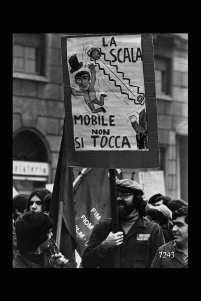 Piazzale Lodi. Corteo: manifestante con cartello recante la scritta "la scala mobile non si tocca".