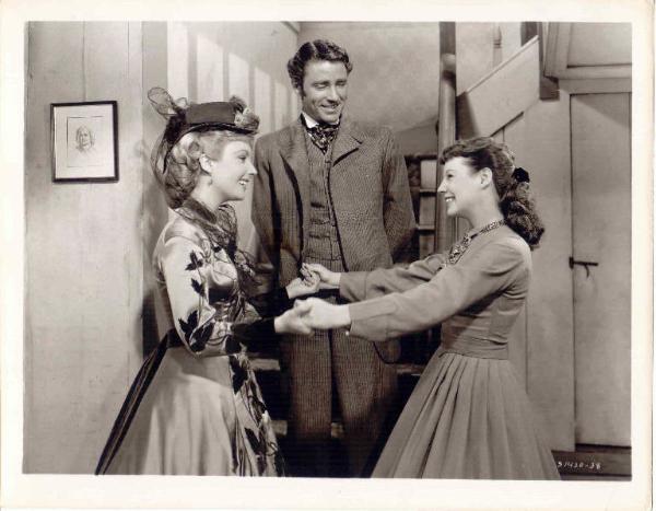 Scena del film "Piccole donne" - regia di Mervyn LeRoy - 1949 - attori June Allyson, Elizabeth Taylor e Peter Lawford