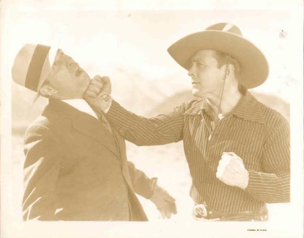 Scena del film "Hollywood Cowboy" - regia Ewing Scott - 1937 - attore George O'Brien