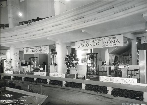 Fiera di Milano - Salone internazionale aeronautico 1937 - Settore accessori, strumenti e materie prime lavorate e semilavorate - Stand della ditta di costruzioni aeronautiche Secondo Mona