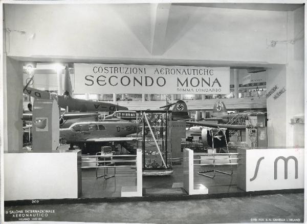 Fiera di Milano - Salone internazionale aeronautico 1937 - Settore accessori, strumenti e materie prime lavorate e semilavorate - Stand della ditta di costruzioni aeronautiche Secondo Mona