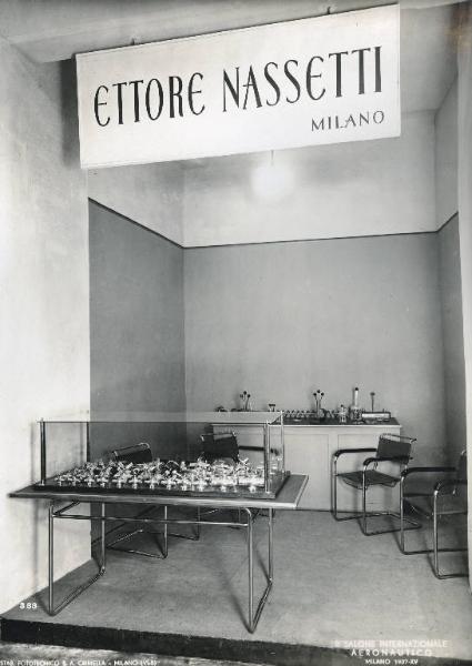 Fiera di Milano - Salone internazionale aeronautico 1937 - Settore accessori, strumenti e materie prime lavorate e semilavorate - Stand della ditta Ettore Nassetti