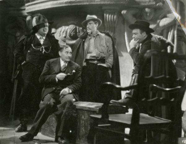 Scena del film "I fratelli Castiglioni" - D'Errico, Corrado, 1939 - In una sala, da destra a sinistra: Camillo Pilotto, Amedeo Nazzarri, Ugo Ceseri, Armando Migliari.