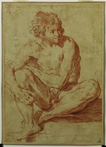 Nudo virile seduto