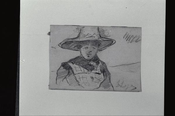 Giovane contadina con cappello di paglia