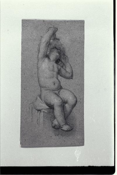 Nudo di bimbo seduto