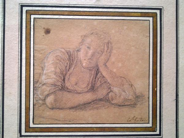 Giovinetta con la testa appoggiata sul braccio